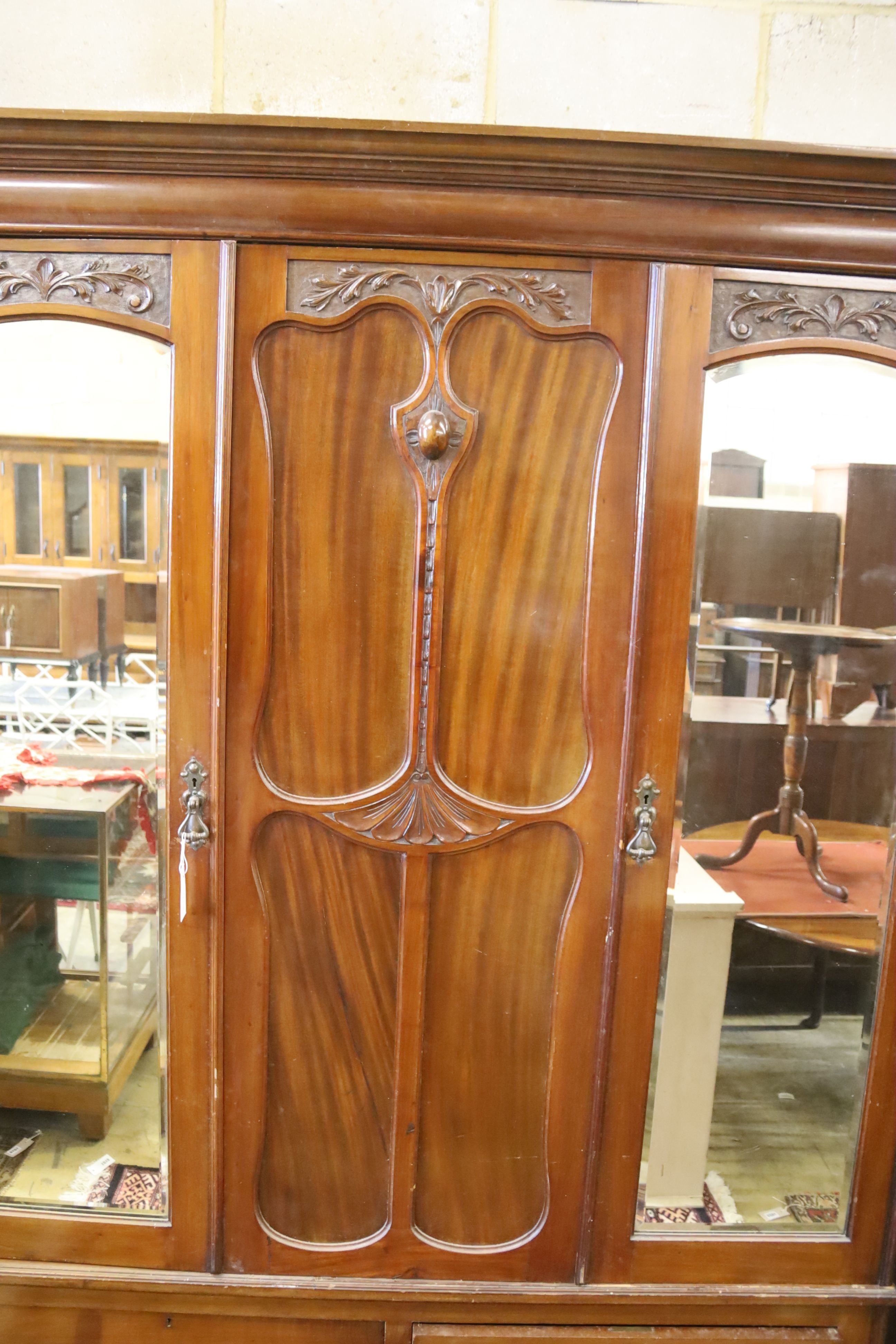 A late Victorian mahogany mirrored wardrobe, length 160cm, depth 54cm, height 210cm